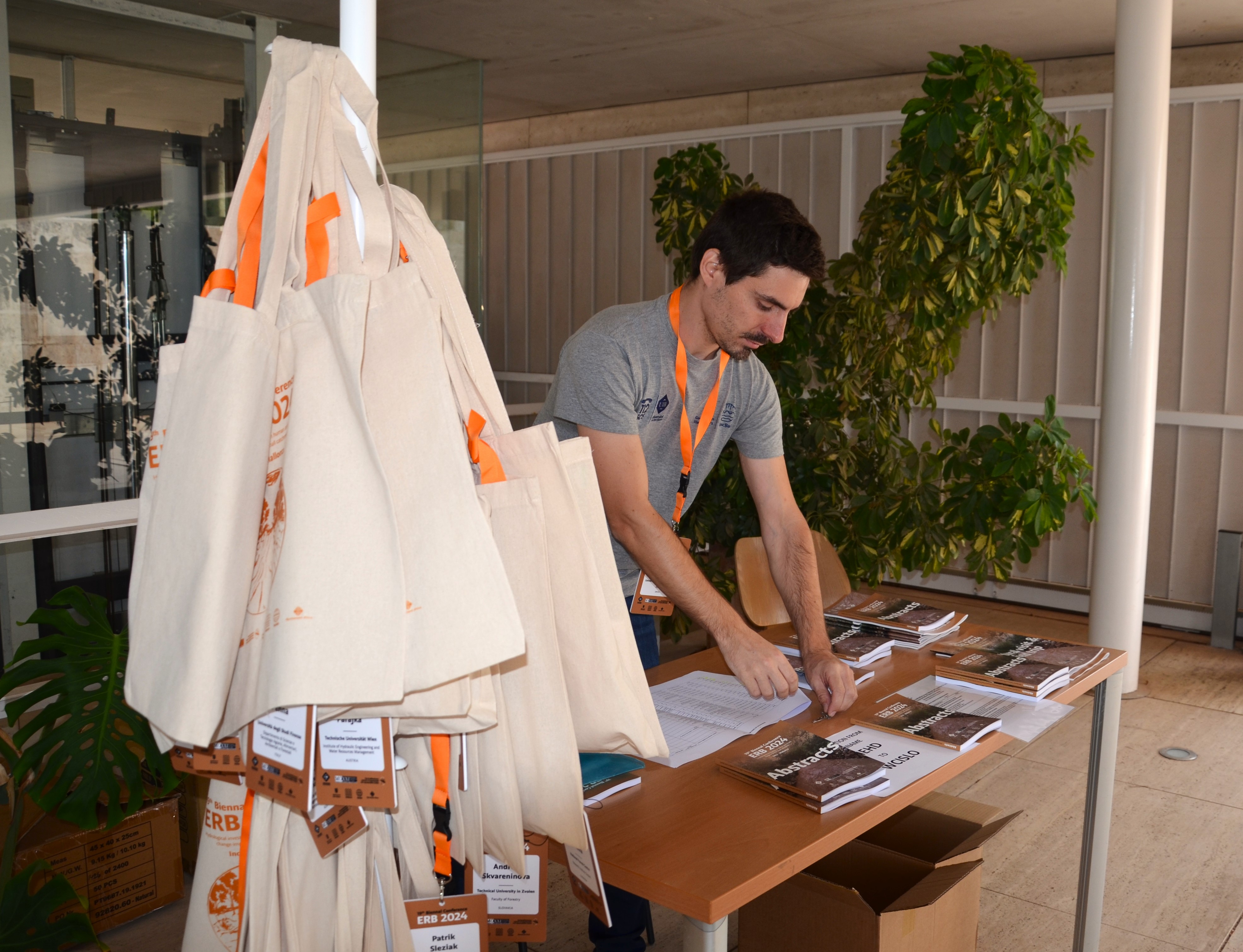 Dr. Josep Fortesa working at the registration table